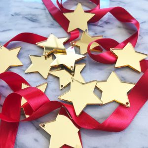 12 Shining Star Decorations in Gold Mirror