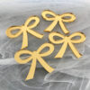 Cute Bow Cake Charms in gold mirror acrylic for cake and cupcake decoration