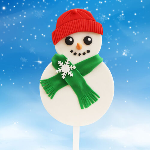 DIY Cake Topper decorated as a snowman using fondant